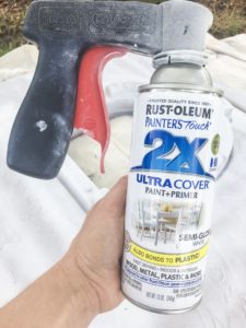Spray Painting a playhouse