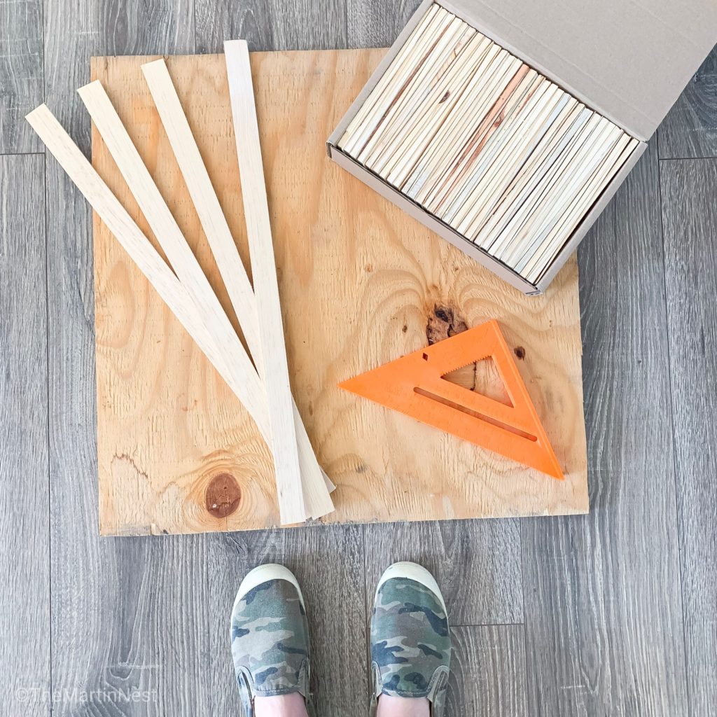 A cheap DIY wall art project made out of scrap wood and wood shims.