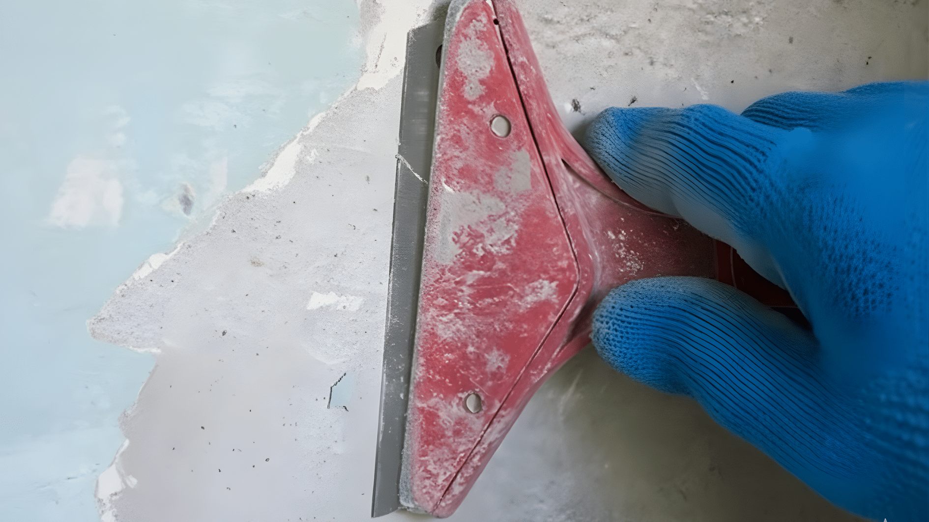 scraping-with-a-putty-knife-or-paint-scraper