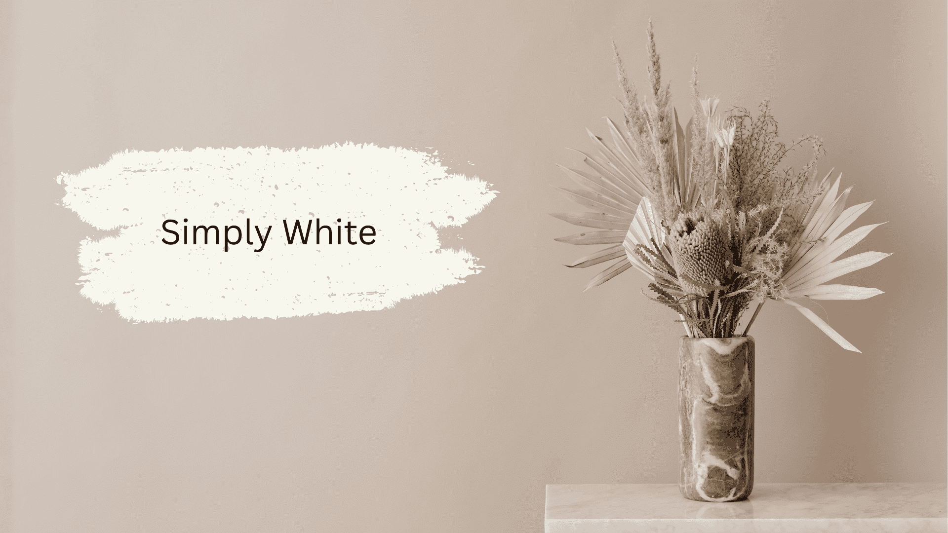 A beige wall sample swatch labeled "Simply White" is displayed next to a marbled vase holding a dried floral arrangement.