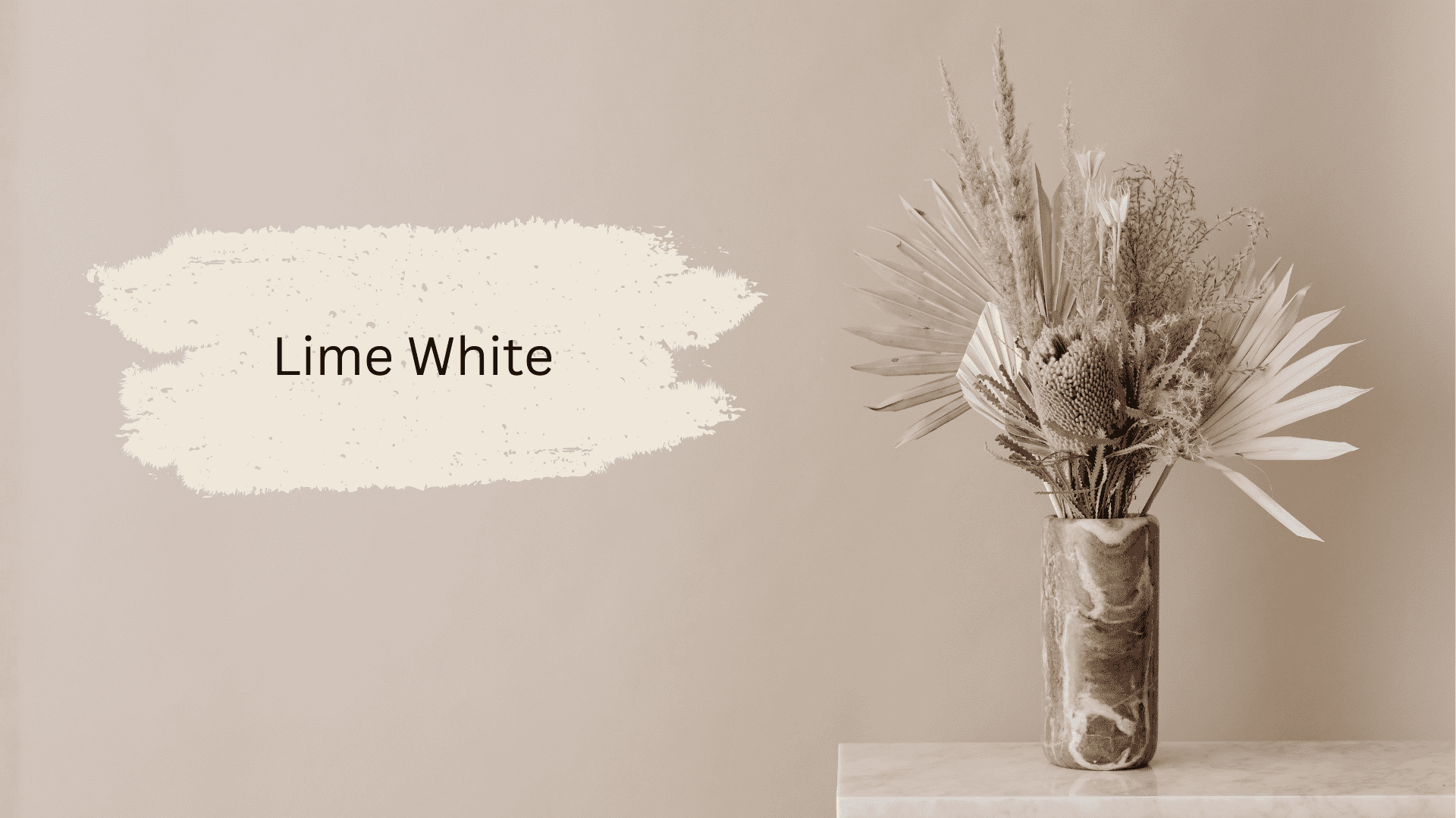 Lime White paint swatch against a warm taupe wall with a dried botanical arrangement in a marble vase