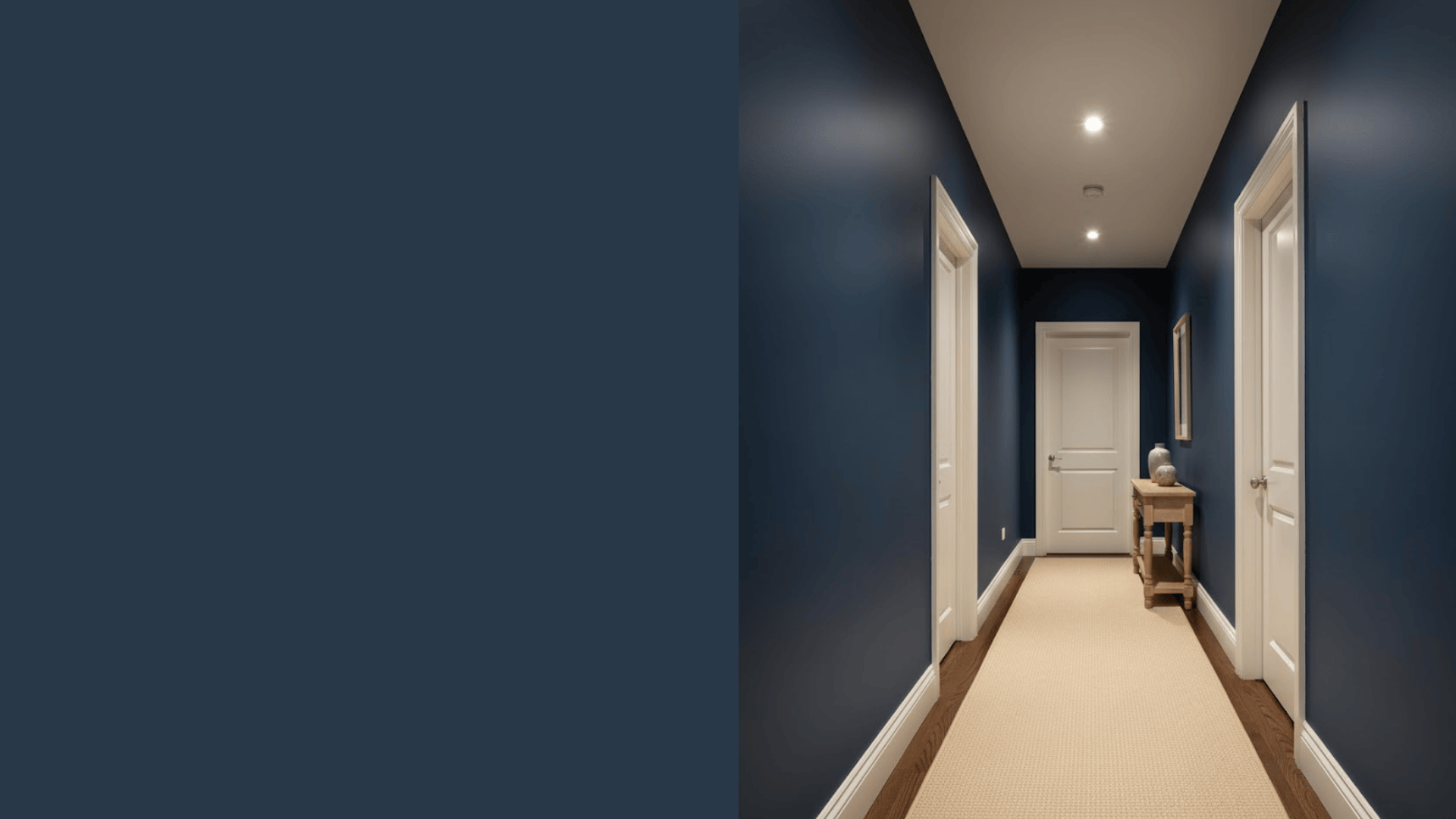 deep navy painted hallway with artificial light showing color does not turn black