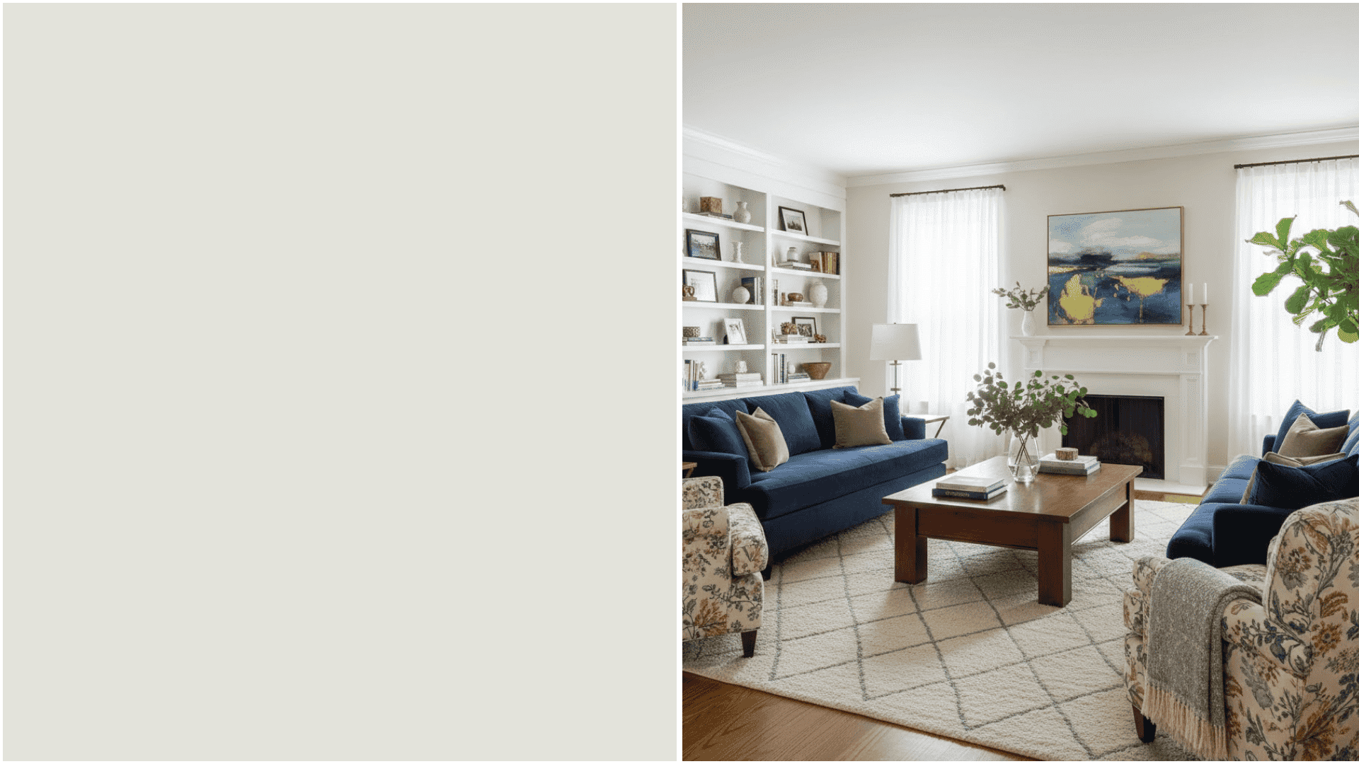 Bright living room featuring a navy blue sofa, built-in white bookshelves, a wooden coffee table, and a colorful abstract painting above a white fireplace